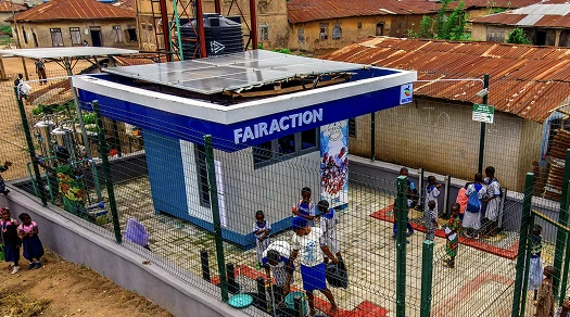 A completed solar-powered smart water kiosk built to an approved architectural design.