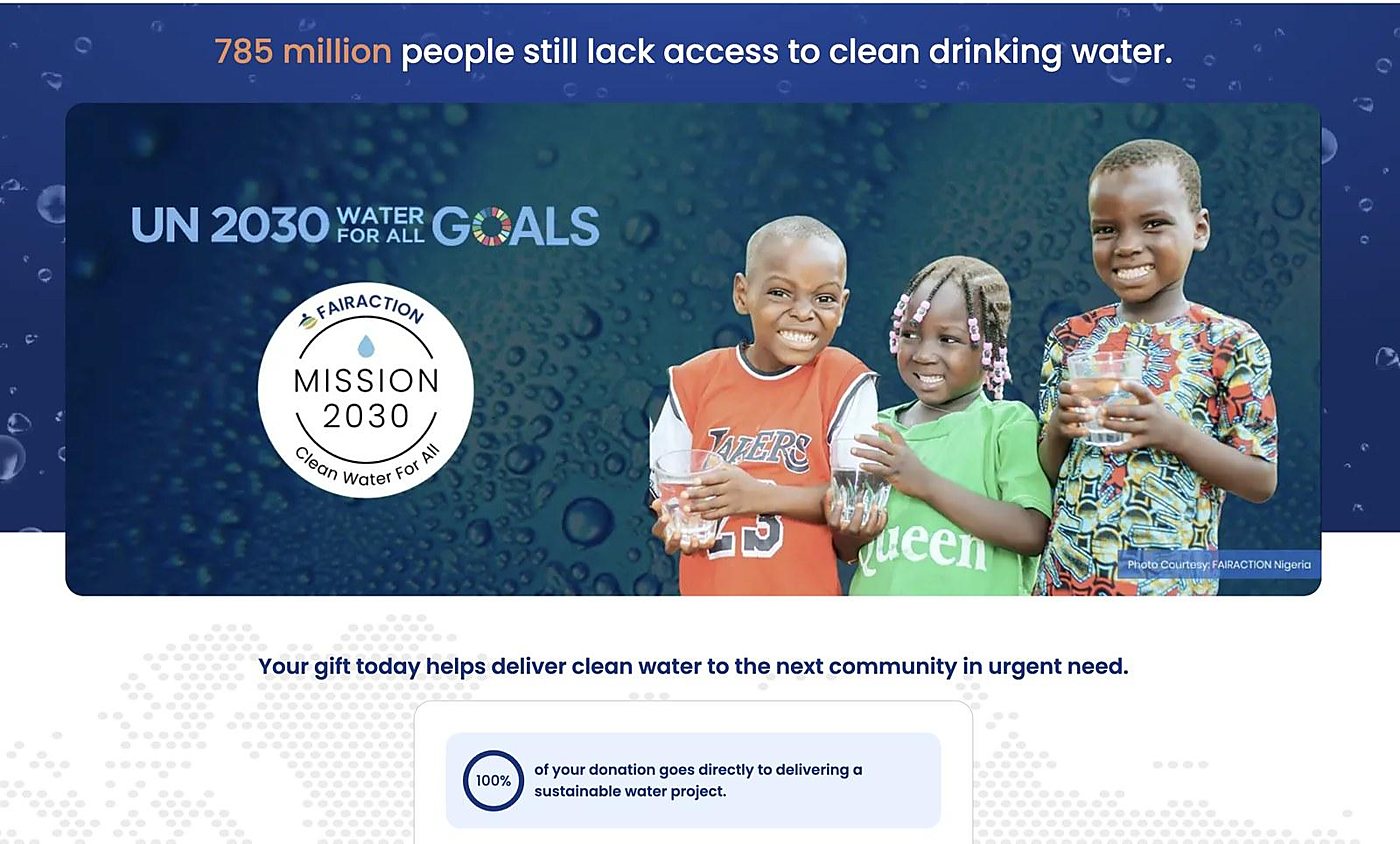 Fairaction's old homepage: a crisis statistic in the headline, a banner of three smiling children holding cups of water, and a donation appeal.